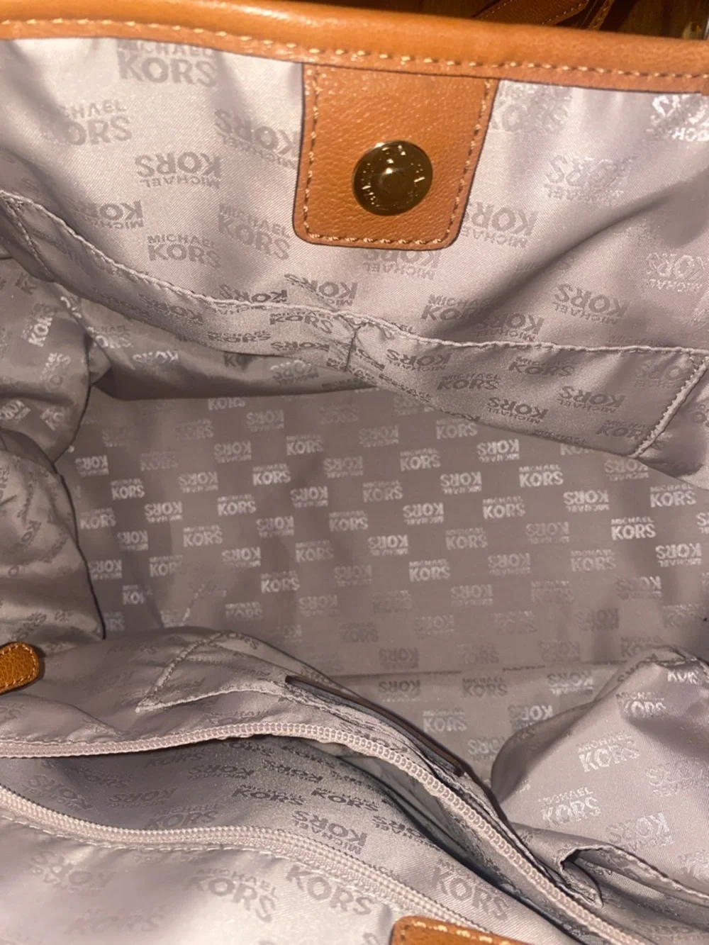 Michael Kors Raffia Tote with Tan Leather Trim and handles.